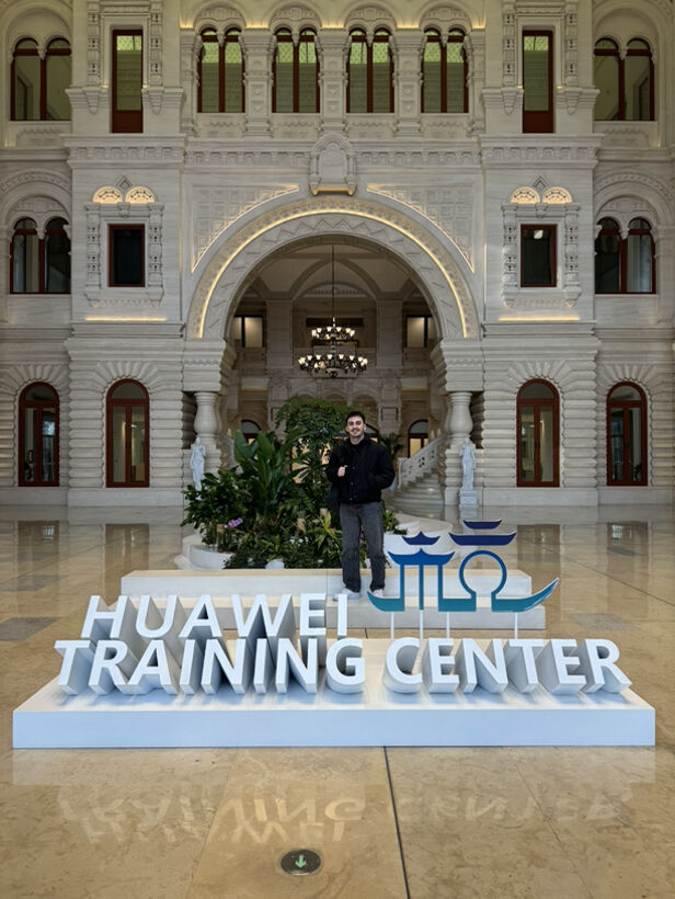 At the Huawei Training Center sign in Hangzhou